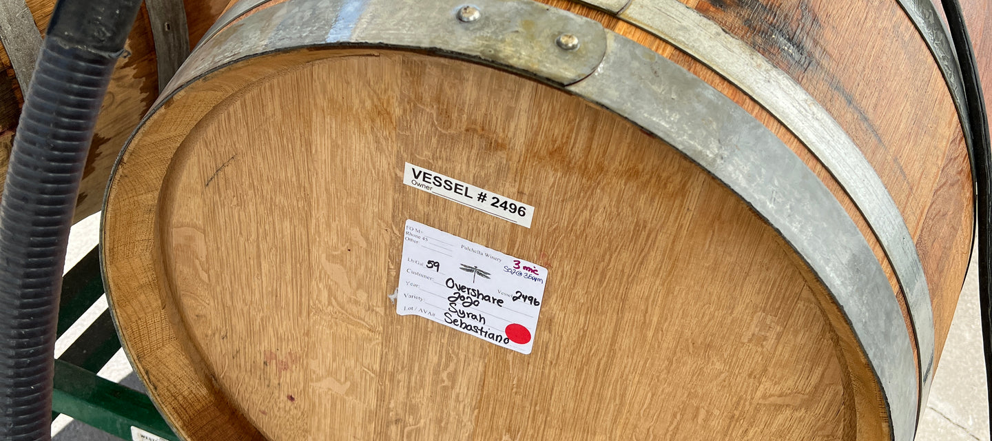 Original website photograph of an Overshare Syrah barrel